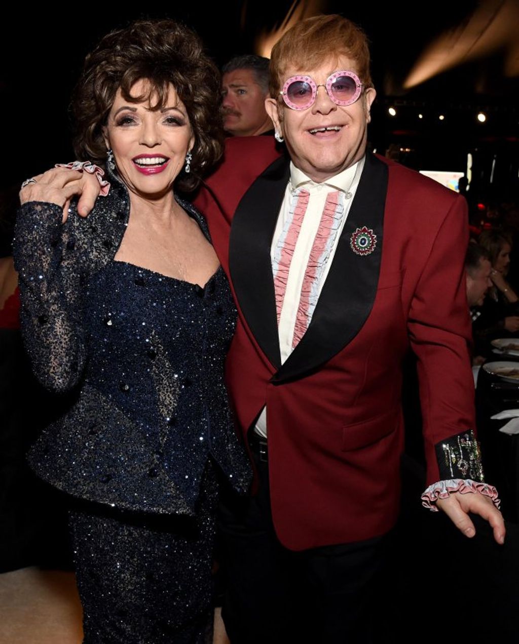 26th Annual Elton John AIDS Foundation Academy Awards Viewing Party sponsored by Bulgari, celebrating EJAF and the 90th Academy Awards  - Inside Oscars WEST HOLLYWOOD, CA - MARCH 04: Joan Collins (L) and Sir Elton John attend the 26th annual Elton John AI