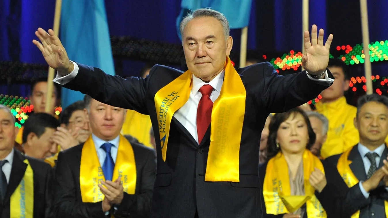 (FILES)
*TO GO WITH AFP STORY BY DANA RYSMUHAMEDOVA WITH DARYA BORONILO* 
A file picture taken on April 4, 2011 shows Kazakh President Nursultan Nazarbayev (C) greeting his supporters during a celebration rally at a sports center in Astana. Citizens in en