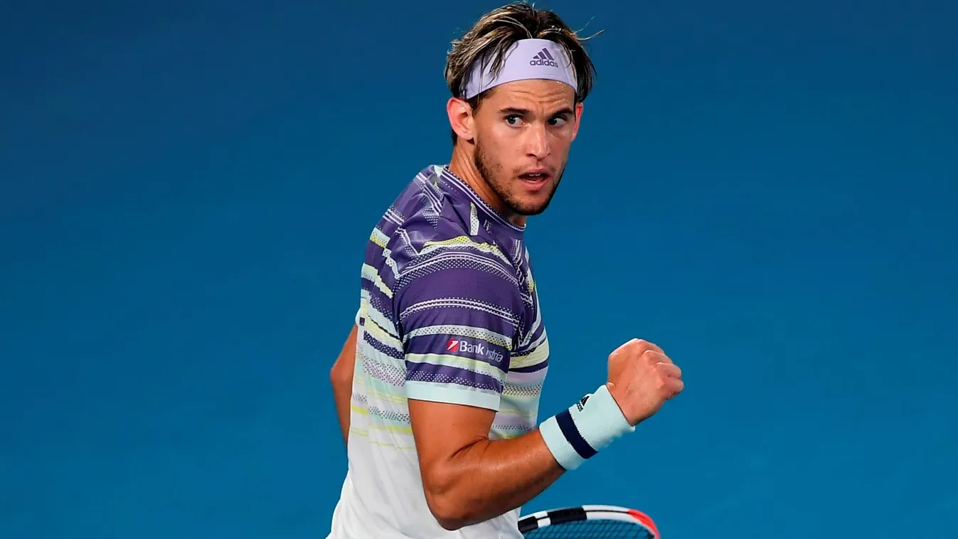 Horizontal Austria's Dominic Thiem reacts after a point against Serbia's Novak Djokovic during their men's singles final match on day fourteen of the Australian Open tennis tournament in Melbourne on February 2, 2020. (Photo by Manan VATSYAYANA / AFP) / I