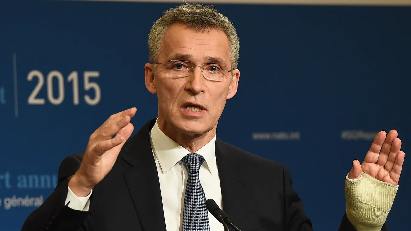 Horizontal NATO Secretary General Jens Stoltenberg presents the 2015 NATO annual report during a press conference in Brussels, January 28, 2016.  / AFP / EMMANUEL DUNAND 