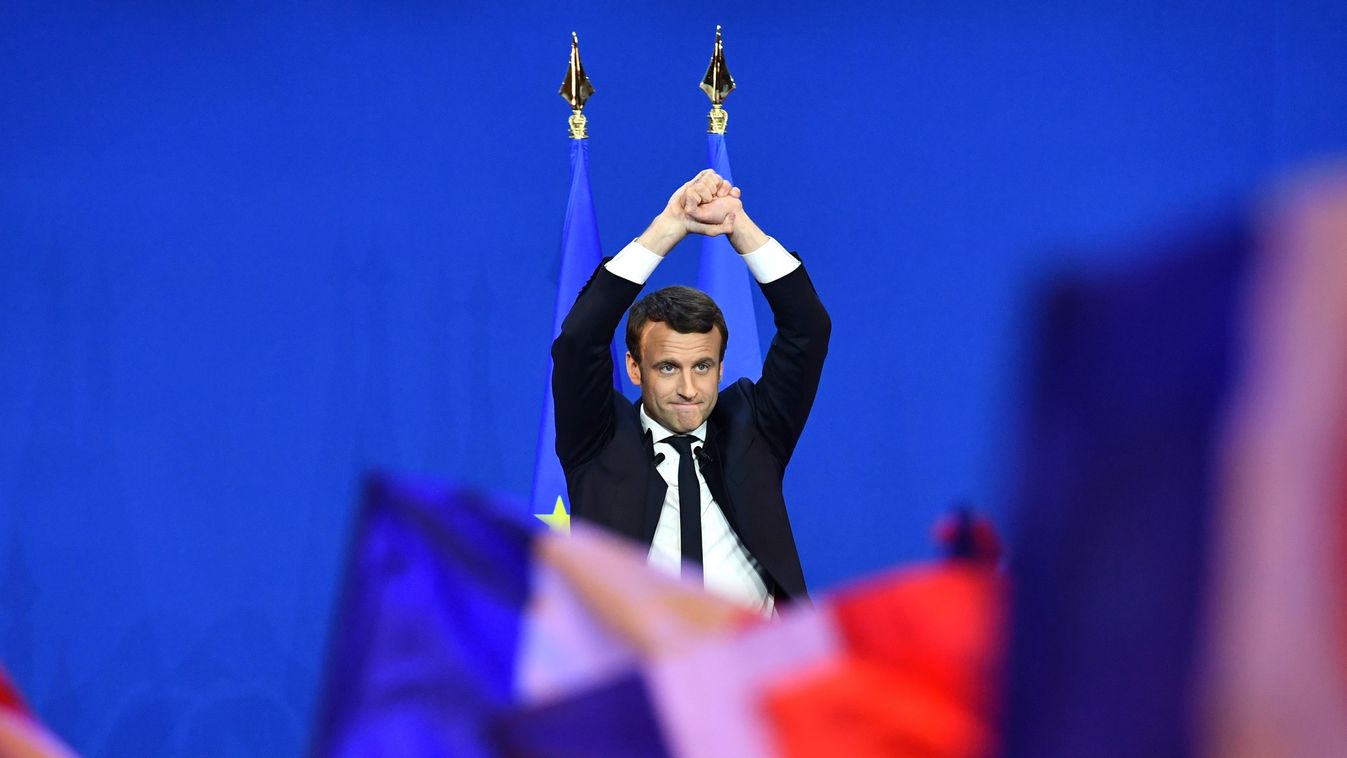 France Paris CANDIDATE Emmanuel Macron first round En Marche French Presidential election PARIS, FRANCE - APRIL 23:  French centrist, independent candidate Emmanuel Macron addresses supporters after winning the lead percentage of votes with 24 percent in 