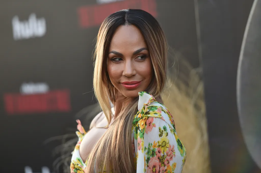 Premiere Of Hulu's "The Handmaid's Tale" Season 2 - Red Carpet GettyImageRank3 People HORIZONTAL SMILING USA California Hollywood - California TCL Chinese Theatre One Person Looking Over Shoulder Television Show Premiere Event Photography Arts Culture and