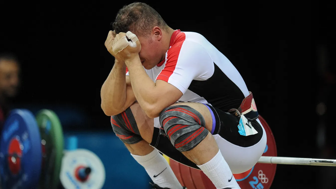 2012 Olympics. Men's 85 kg Weightlifting medal athlete award weightlifter pedestal Horizontal 