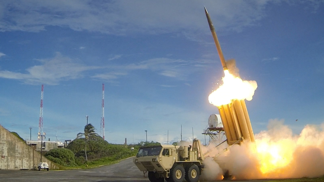 defence Horizontal This US Department of Defense/Missile Defense Agency handout photo shows two THAAD interceptors and a Standard-Missile 3 Block IA missile were launched resulting in the intercept of two near-simultaneous medium-range ballistic missile t