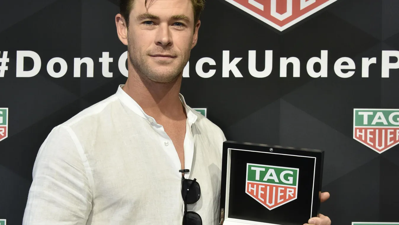 TAG Heuer Celebrates The 102nd Running Of The Indianapolis 500 Race As The Official Timepiece With Brand Ambassador, Chris Hemsworth GettyImageRank2 Run People Instrument of Time VERTICAL Looking At Camera THREE QUARTER LENGTH SUNGLASSES Motorsport Auto R