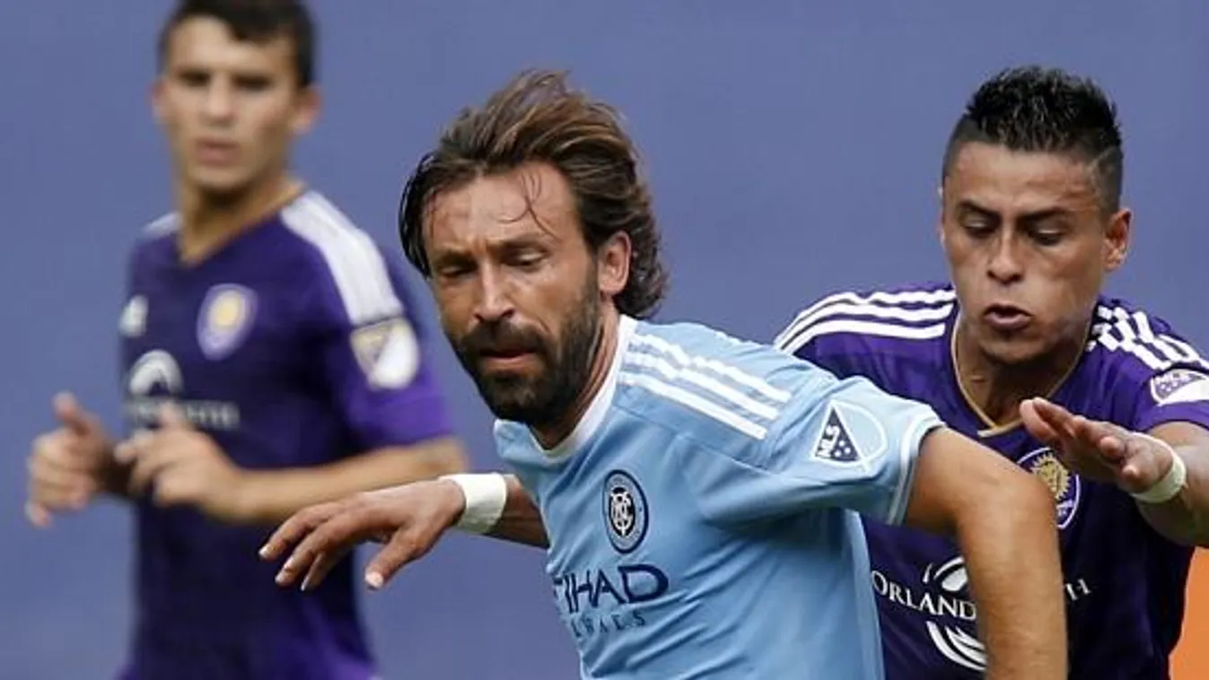 Andrea Pirlo, Darwin Ceren New York City FC's Andrea Pirlo (21), of Italy, controls the ball ahead of Orlando City SC's Darwin Ceren (17), of El Salvador, during the second half of an MLS soccer game at Yankee Stadium, Sunday, July 26, 2015, in New York. 
