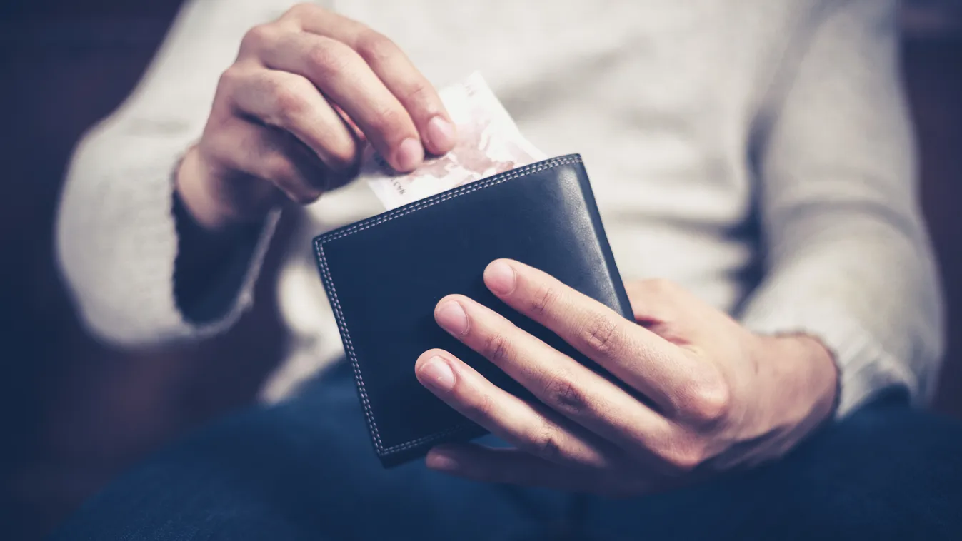 Man getting money out of his wallet Achievement Bringing Home The Bacon Buy Buying Caucasian Change Purse Close-up Currency Debt Europe European Union Currency Finance Gift Giving Holding Home Finances Human Hand Illness Leather Male Men One Person Paper 