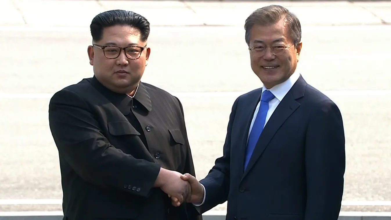 diplomacy summit Horizontal This screen grab from the Korean Broadcasting System (KBS) taken on April 27, 2018 shows North Korea's leader Kim Jong Un (L) and South Korea's President Moon Jae-in shaking hands at the Military Demarcation Line that divides t