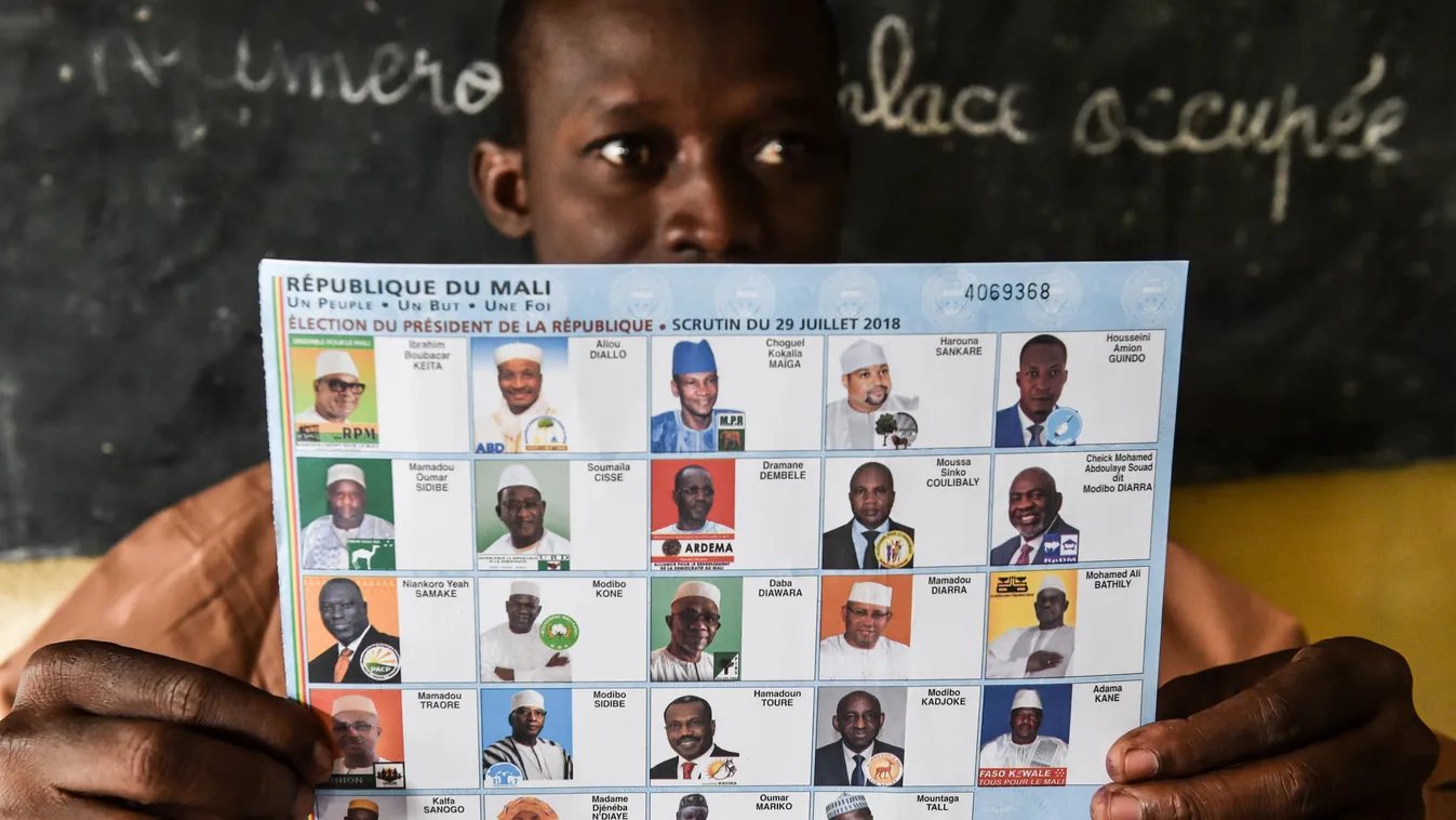 Horizontal An election official holds a ballot paper at the polling station on July 29, 2018 in Bamako during Malian presidential elections.
Mali went to the polls on July 29, 2018, with actual President seeking a second 5-year term in the fragile Sahel s