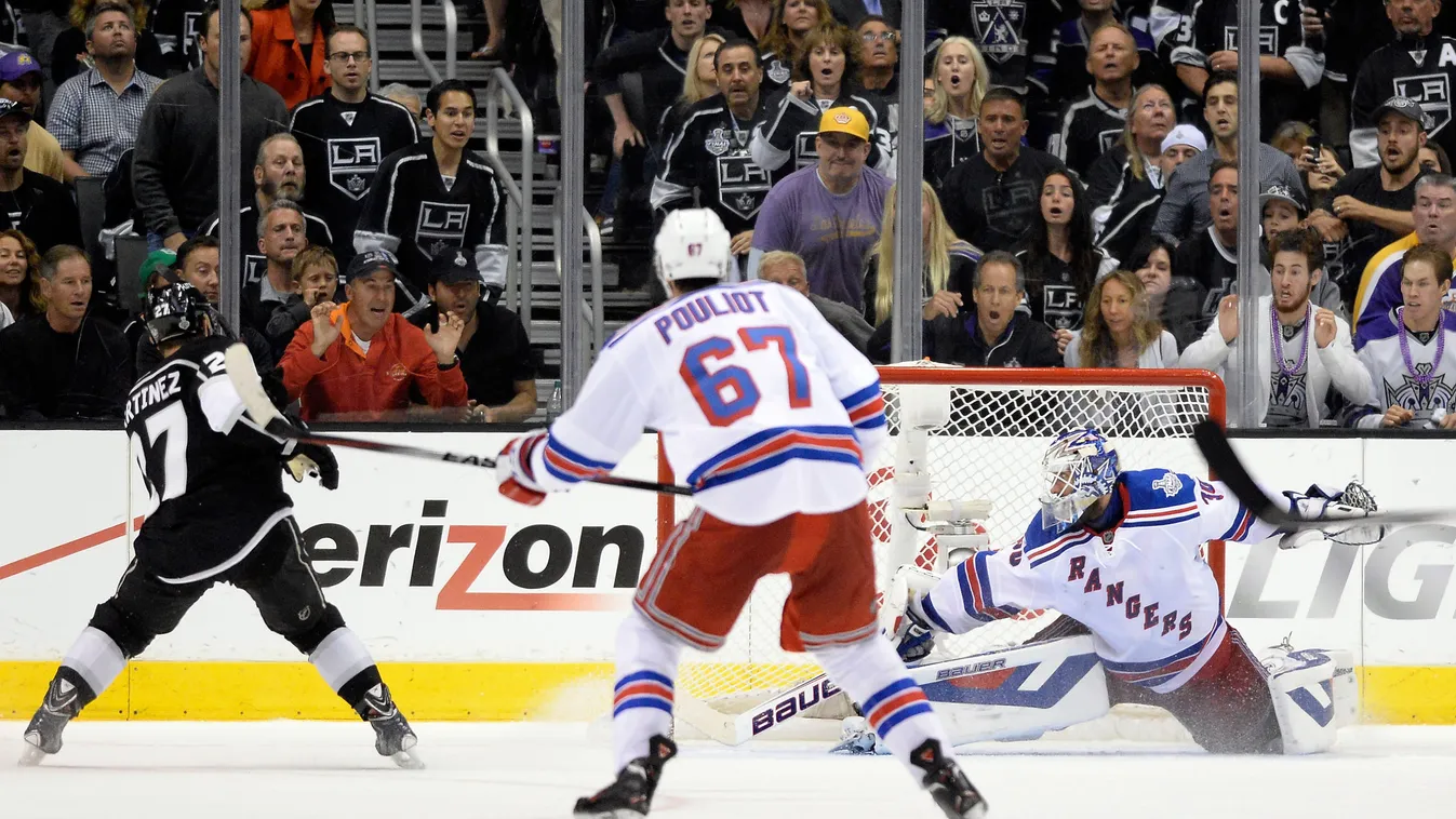 2014 NHL Stanley Cup Final - Game Five GettyImageRank1 Double Success Topics SPORT HORIZONTAL ICE HOCKEY Scoring Giving USA California City Of Los Angeles Winning Staples Center Los Angeles Kings National Hockey League Playoffs Game Five Stanley Cup Final