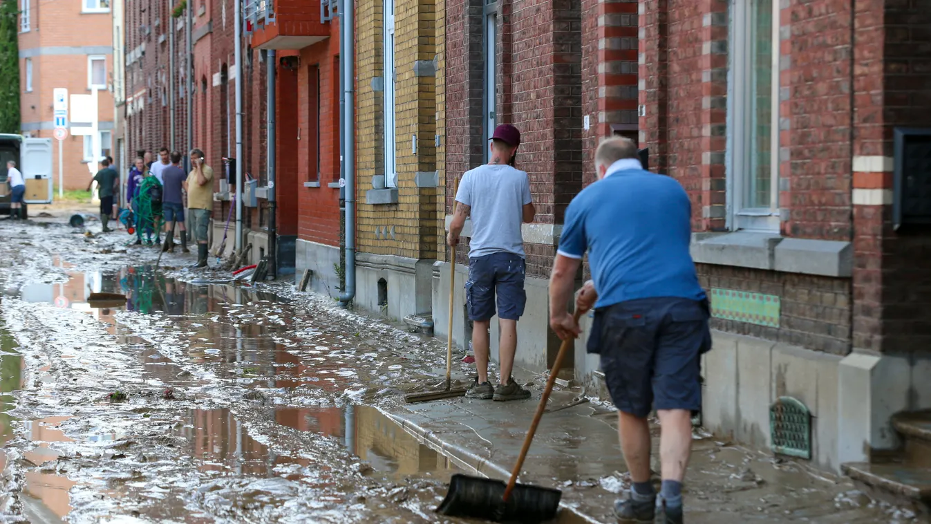 Horizontal FLOOD BAD WEATHER NATURAL DISASTERS CONSEQUENCES OF A CATASTROPHE DAMAGE MUD INHABITANT CLEANING 