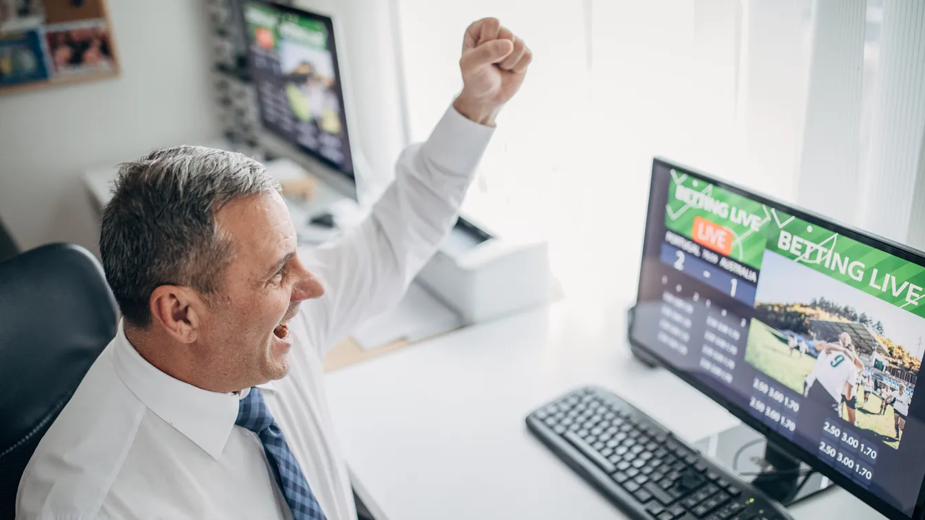 Sports betting for relaxation, businessman in his office, live betting 