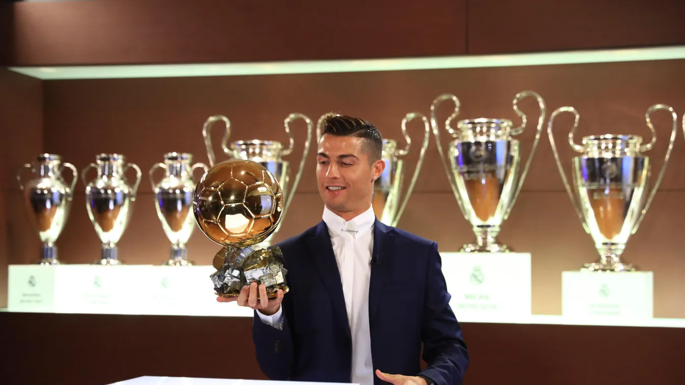 MAGAZINE CRISTIANO RONALDO MAGAZINE BALLON D'OR AWARD SHOOTING PHOTO SHOOT PORTRAIT CIVILIAN CLOTHES TROPHY TROPHIES ROOM 