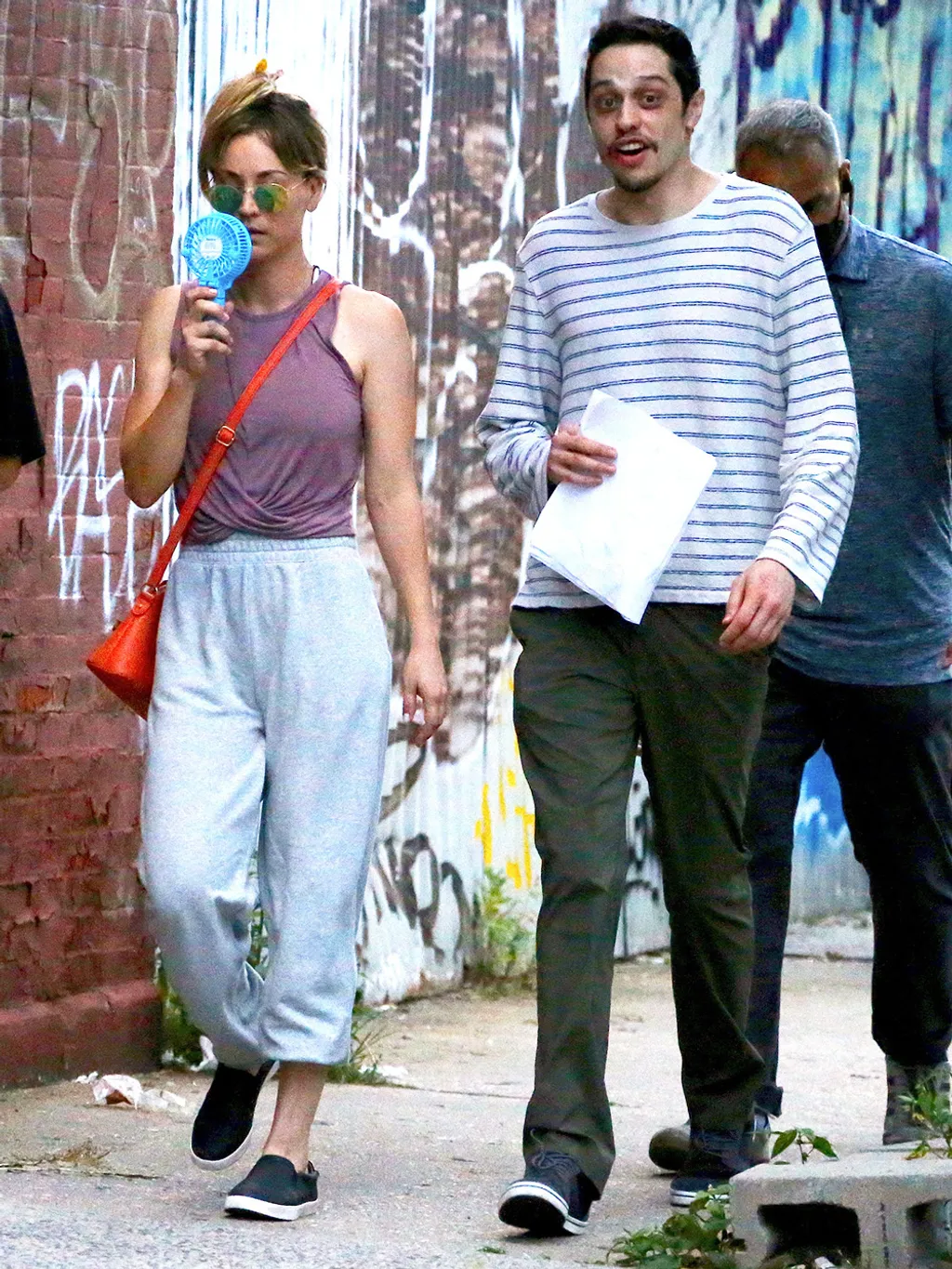 Kaley Cuoco And Pete Davidson On Set In New York Actress,Actor,Acting,Filming,Film Set,On Set,Location,In Charact Actors Kaley Cuoco and Pete Davidson on set of their movie "Meet Cute" filming in Brooklyn, New York on August 11, 2021. Kaley's stunt double