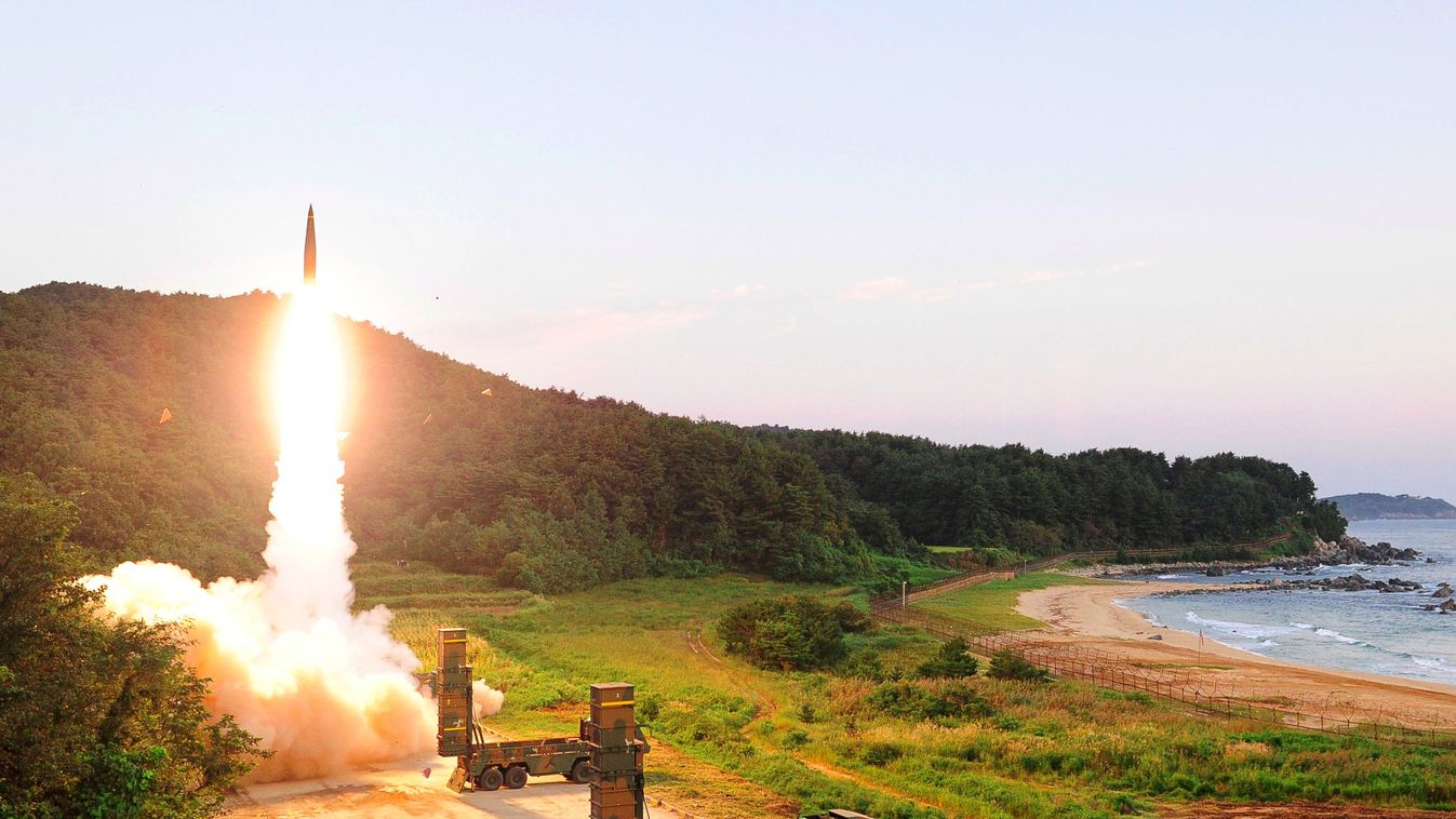 Horizontal This handout photo taken on September 4, 2017 and provided by South Korean Defence Ministry in Seoul shows South Korea's missile system firing Hyunmu-2 missile into the East Sea from an undisclosed location on South Korea's east coast during a 