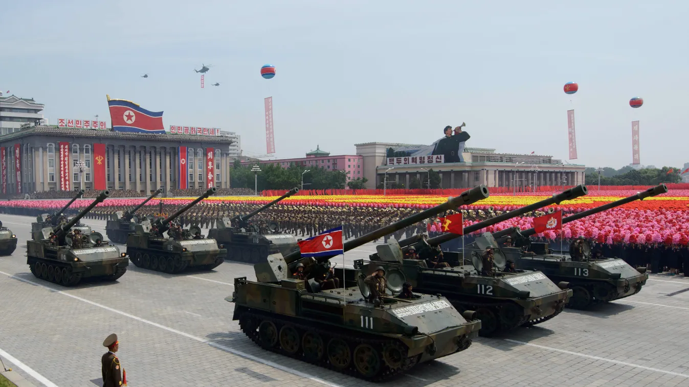 TO GO WITH NKorea-politics-anniversary-military,ADVANCER by Giles HEWITT
(FILES) This file photo taken on July 27, 2013 shows North Korean tanks passing through Kim Il-Sung Square during a military parade marking the 60th anniversary of the Korean war ar 