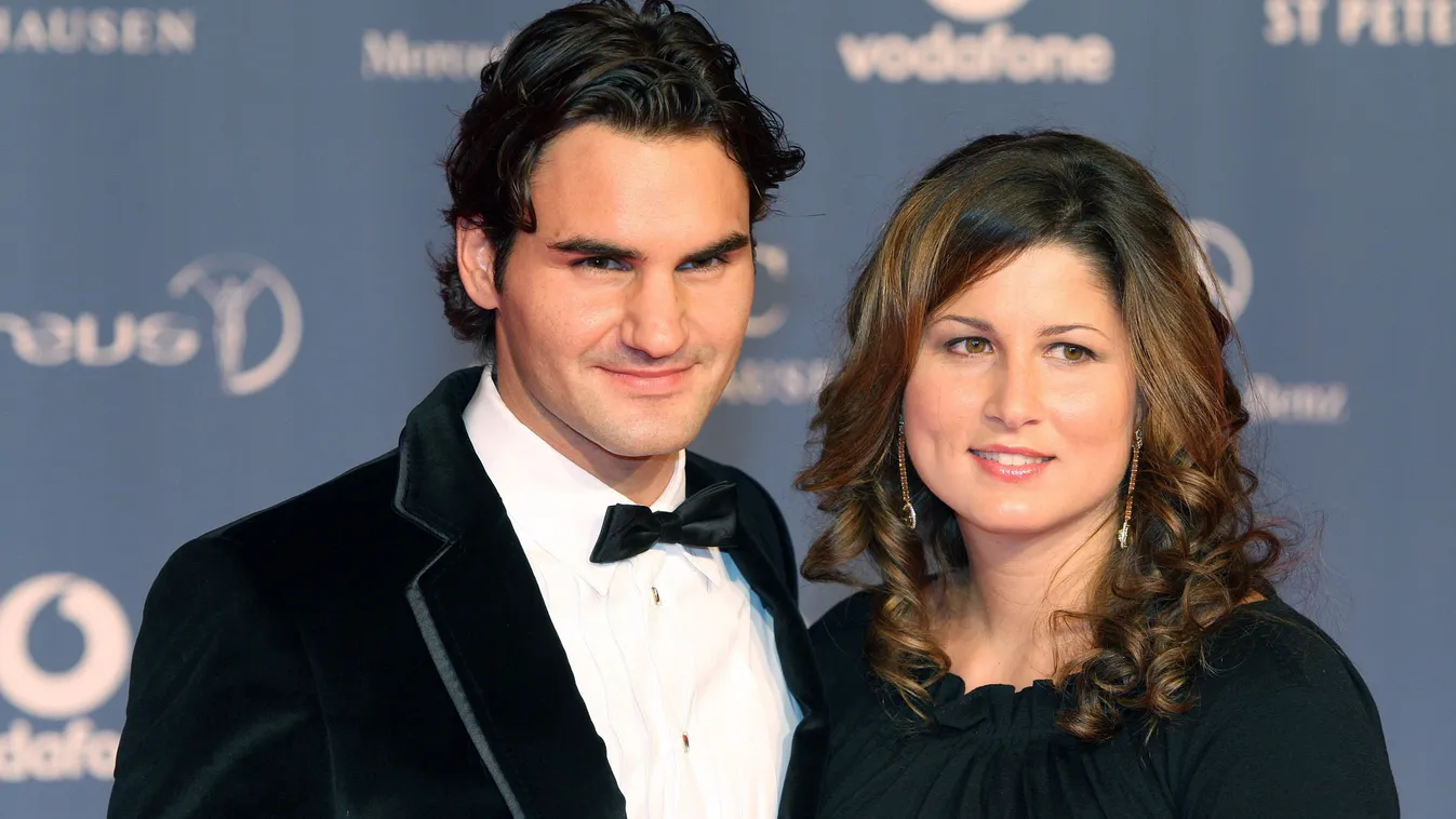 LAUREUS-2008-RUS-FEDERER HORIZONTAL Swiss tennis player Roger Federer (L) and his girlfriend Mirka Vavrinec pose at the 2008 Laureus World Sports Awards ceremony in St. Petersburg Russia on February 18, 2008. The awards are given annually to sports people