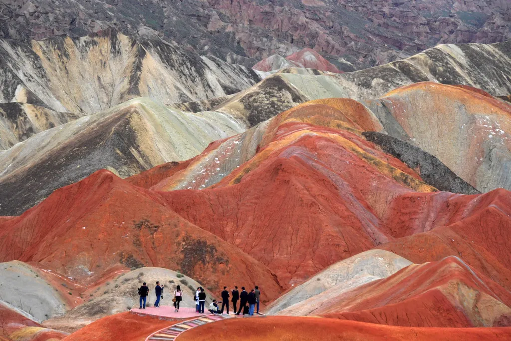 Chinese tourists damage ancient Danxia landform where dinosaurs roamed, post video to brag China Chinese Gansu Zhangye Danxia landform geological park tourist damage brag 