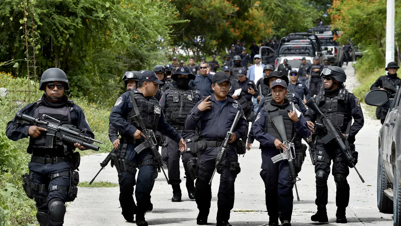 State policemen are deployed to participate in a joint patrol with marines, army soldiers, ministerial policemen and relatives of young that went missing during the last weekend clashes in Iguala, Guerrero state, Mexico on October 1, 2014. The fate of 43 