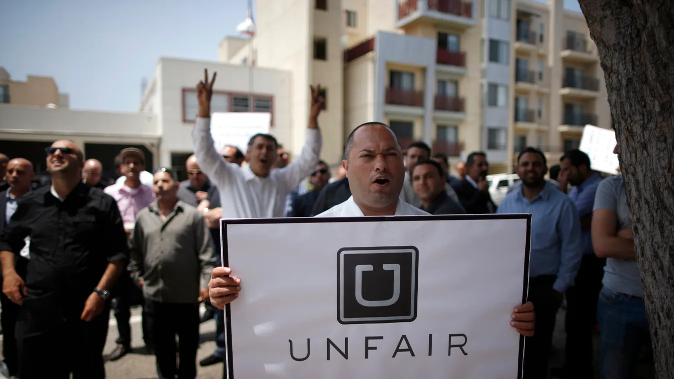 Uber drivers protest against working conditions outside the company's office in Santa Monica 