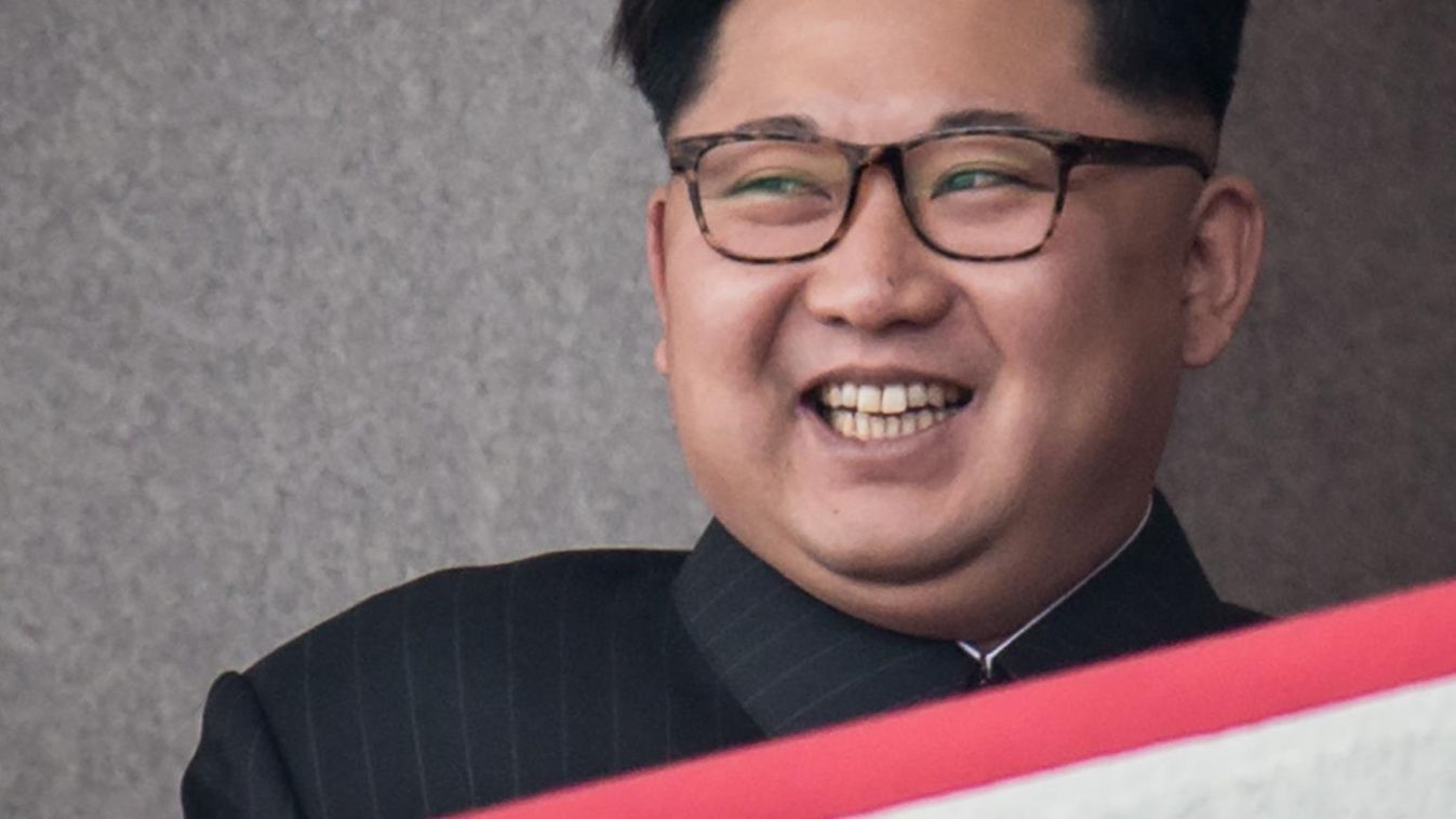 Horizontal SOURIANT PORTRAIT (FILES) This file photo taken on May 10, 2016 shows North Korean leader Kim Jong-Un watching a military parade and mass rally on Kim Il-Sung square in Pyongyang. 
US military confirms that North Korea fired a ballistic missile