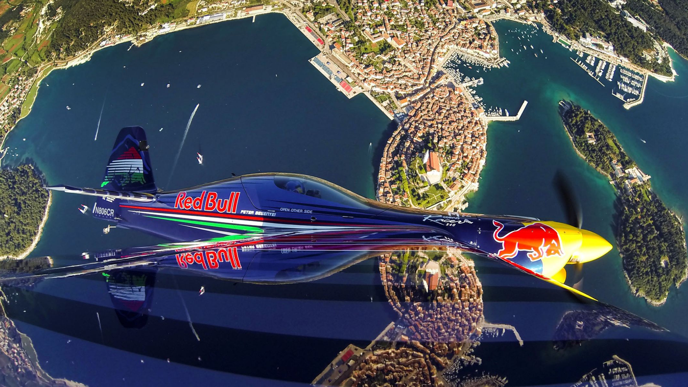 Peter Besenyei (HUN) - Racon flight Peter Besenyei of Hungary fly over the city of Rovinj prior to the second stage of the Red Bull Air Race World Championship in Rovinj, Croatia on April 10, 2014. 