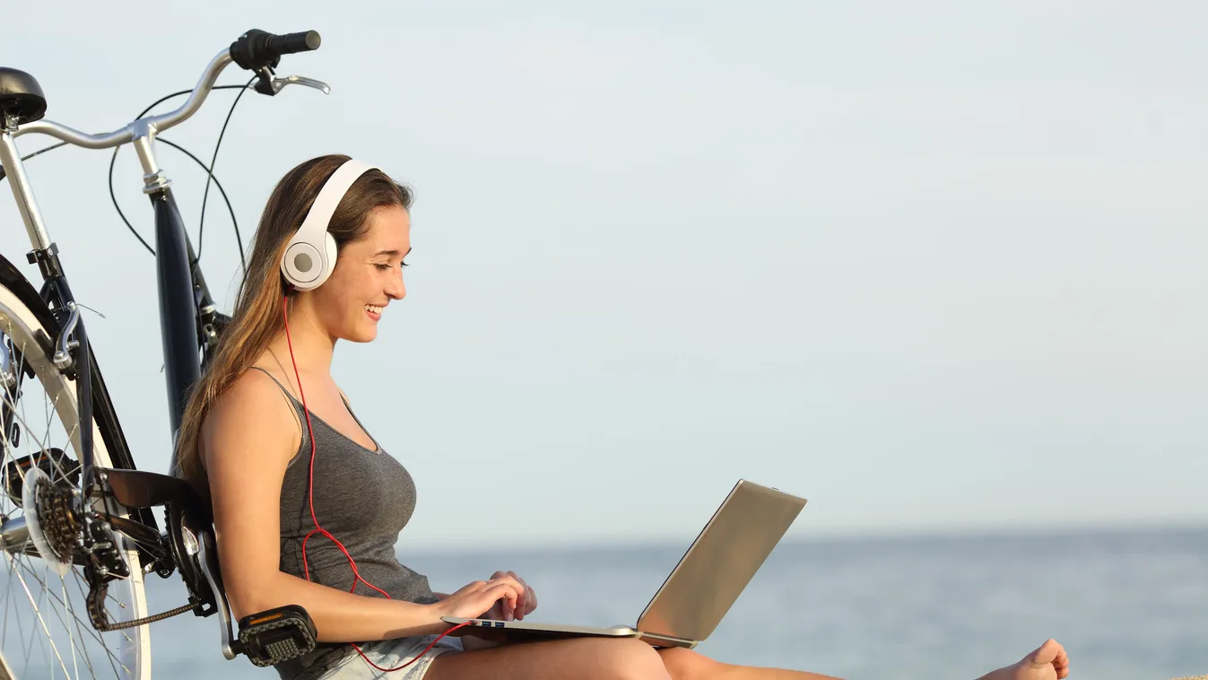 laptop summer music study studying beach wireless learn learning girl people play playing headphones job teen app computer hearing holiday student apps mobile movies video device reading watching software entrepreneur webcam working young game technology 