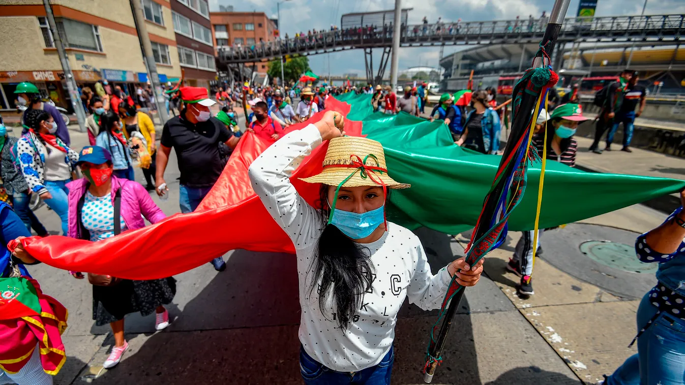 indigenous Horizontal Colombian indigenous people demonstrate against the government in the framework of a "Minga" (indigenous meeting) in Bogota, on October 19, 2020. - Thousands of indigenous Colombians arrived in the country's capital on Sunday, demand