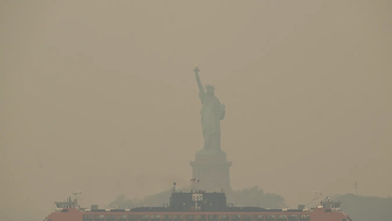 Canadian wildfire smoke creates unhealthy air quality in NYC Canadian wildfire,Canadian wildfire smoke,Hazy sunset in NYC,unh Horizontal 