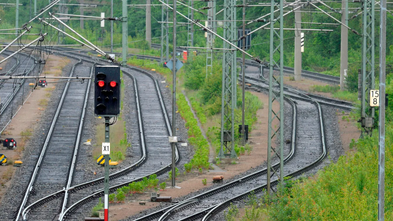 A red stop light is seen at the rail tracks of the freight train terminal in Munich on May 19, 2015 few hours before German train drivers of the Deutsche Bahn (DB) start their ninth strike in a labour dispute. It is the latest flareup in a battle over wag