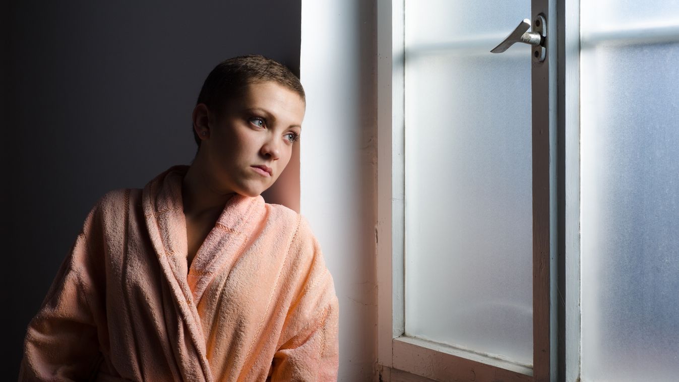 Cancer patient standing in front of hospital window Adolescence Teenagers Only Portrait Girls Teenage Girls Women Females Fine Art Portrait Tumor Curing Hairless Chemotherapy Drug Nightie Pain Young Adult Teenager Fear Standing Looking Cancer - Illness On