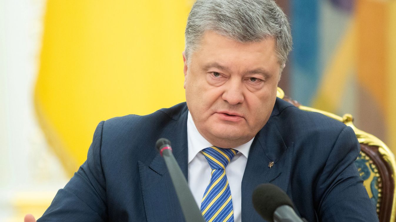 Horizontal This handout picture taken and released by the Ukrainian Presidential press service shows President of Ukraine Petro Poroshenko leading a session of the National Security and Defense Council of Ukraine in Kiev early on November 26, 2018, follow