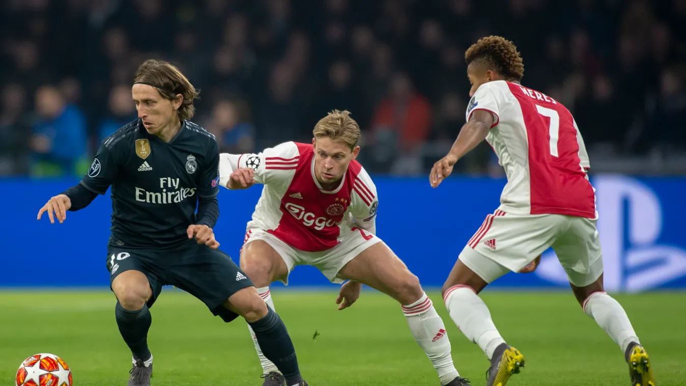 Ajax v Real Madrid - UEFA Champions League Round of 16: First Leg PLAYER Sports SOCCER PLAYER SPORTS EQUIPMENT Soccer Team sport BALL GAME Football player FOOTBALL Sport venue GRASS person FIELD ball BUILDING PLAYING outdoor GAME Ajax Amsterdam Real Madri