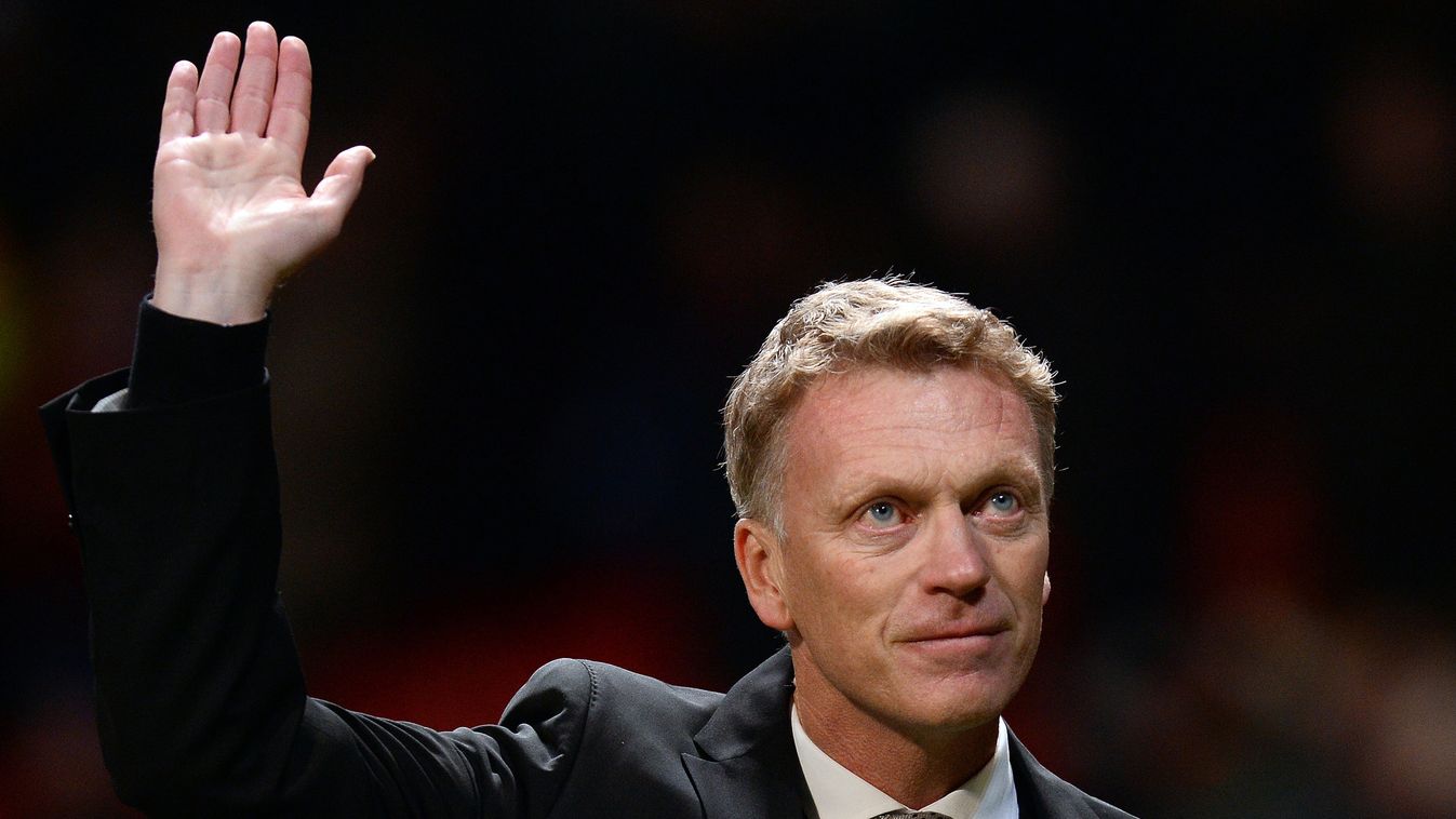 179331429 (FILES) In this file picture taken on December 10, 2013 Manchester United's Scottish manager David Moyes leaves the field after the UEFA Champions League football match between Manchester United and Shakhtar Donetsk at Old Trafford in Manchester