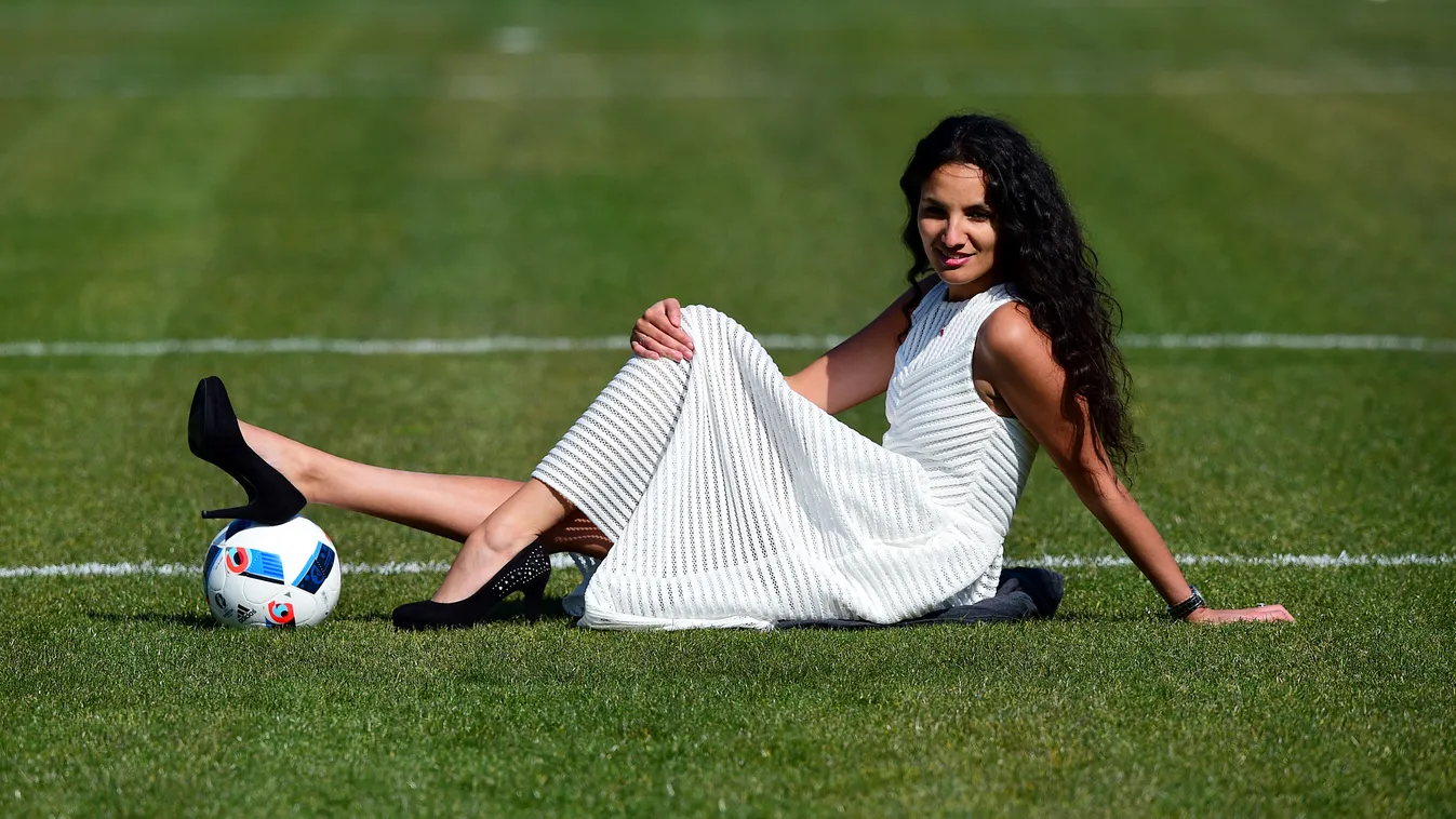 Horizontal FOOTBALL HEADSHOT DRESS FULL-LENGTH SEATED GRASS 