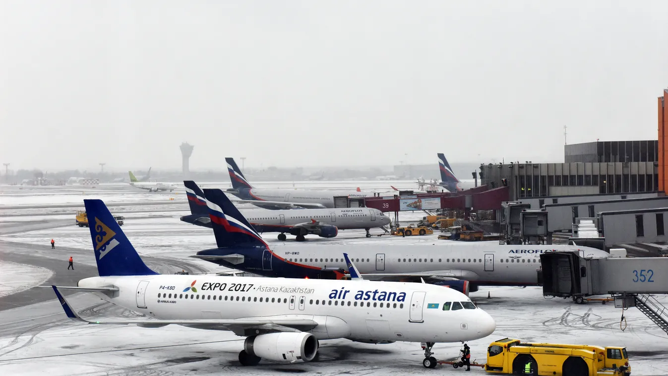 Sheremetyevo airport winter snow truck buses service equipment logo airbus HORIZONTAL expo tow coloring kazakhstan a320 air astana expo2017 SQUARE FORMAT 2797982 02/12/2016 A Airbus A320 of Air Astana (foreground) and an Airbus A321 of Aeroflot at the She