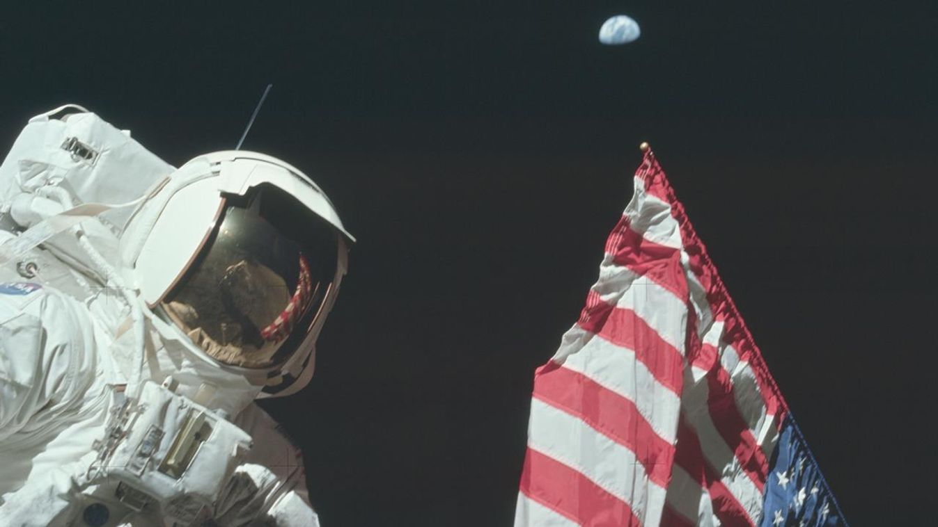 74482 Eugene Cernan planting flag on Moon during Apollo 17. (NASA/National Archives and Records Administration) 