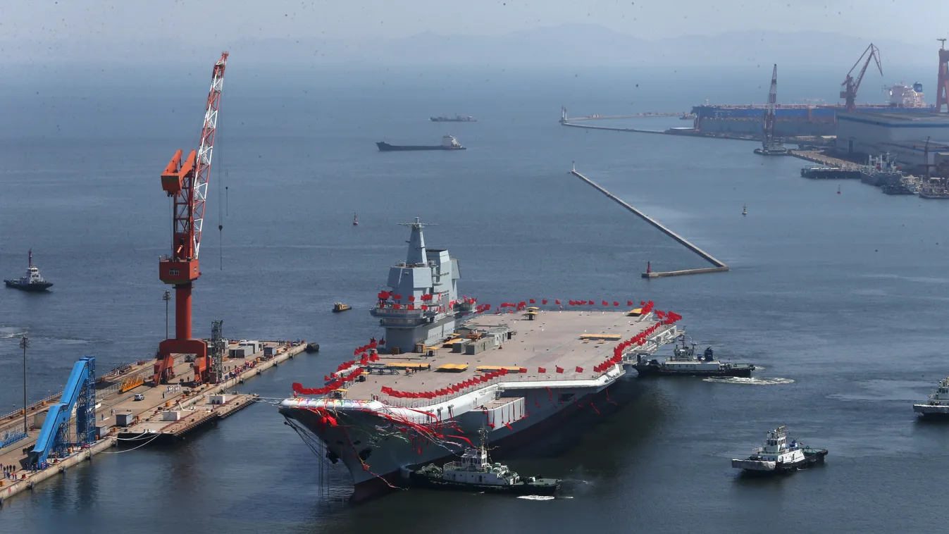 China Chinese Liaoning Dalian aircraft carrier Type 001A warship navy China's first domestically built aircraft carrier, the Type 001A, takes water at Dalian Port in Dalian city, northeast China's Liaoning province, 26 April 2017.

China has launched it 