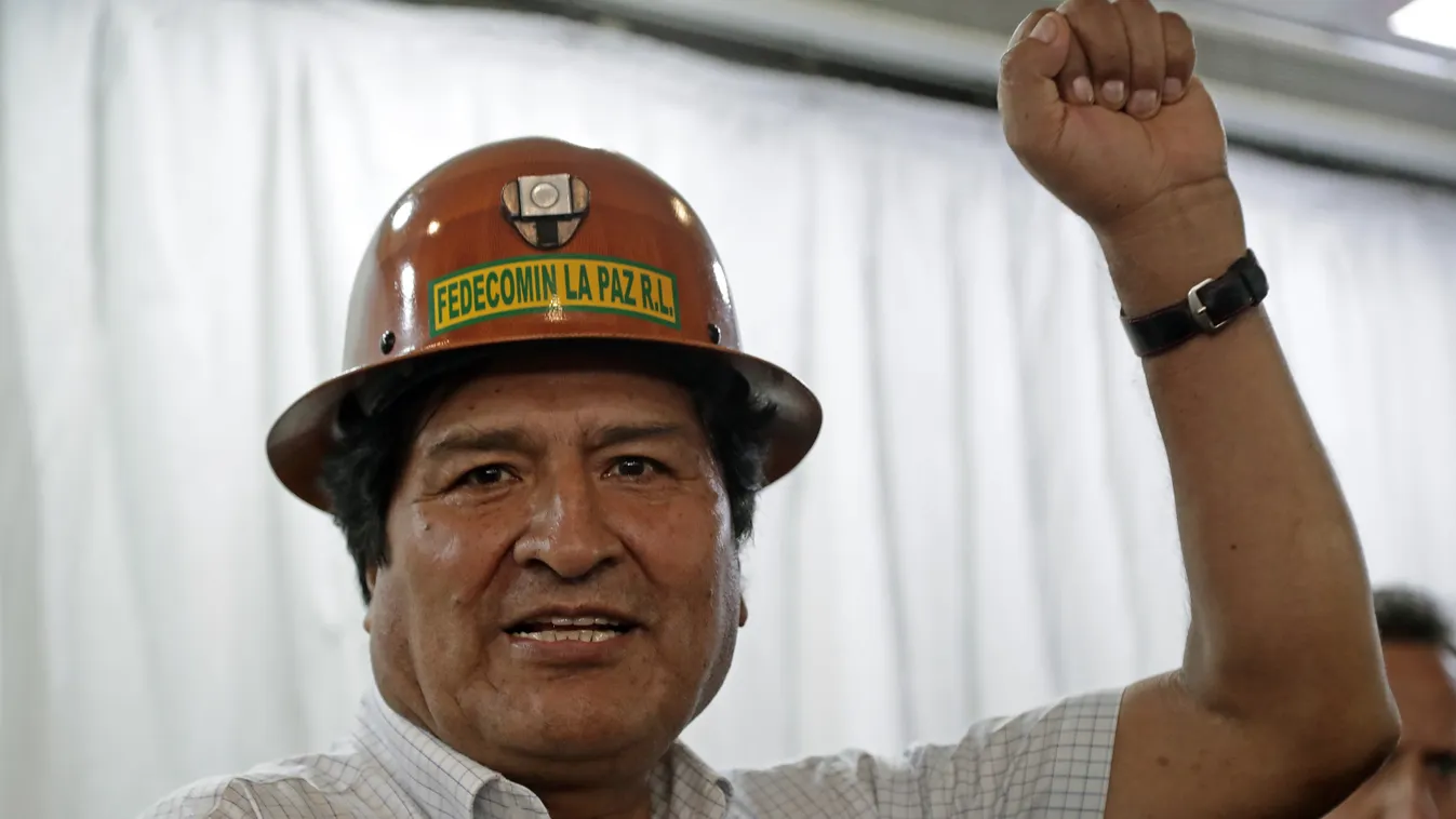 court Horizontal RAISED FIST HELMET ATTITUDE PRESS CONFERENCE POLITICS HEADSHOT PORTRAIT-CLOSE-UP (FILES) In this file picture taken on December 29, 2019 Bolivian ex-president Evo Morales, exiled in Argentina, gestures before offering a press conference a