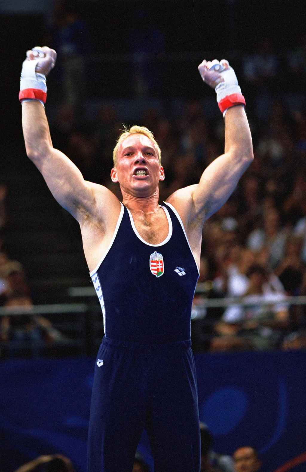 Sydney 2000 Day Nine ATHLETE ATHLETICS COMPETITION gymnastics half length OLYMPICS WINNER international sports tradition 378991 15: Szilveszter Csollany of Hungary wins the gold in the Men's Rings at the Sydney Superdome September 24, 2000 on Day Nine of 