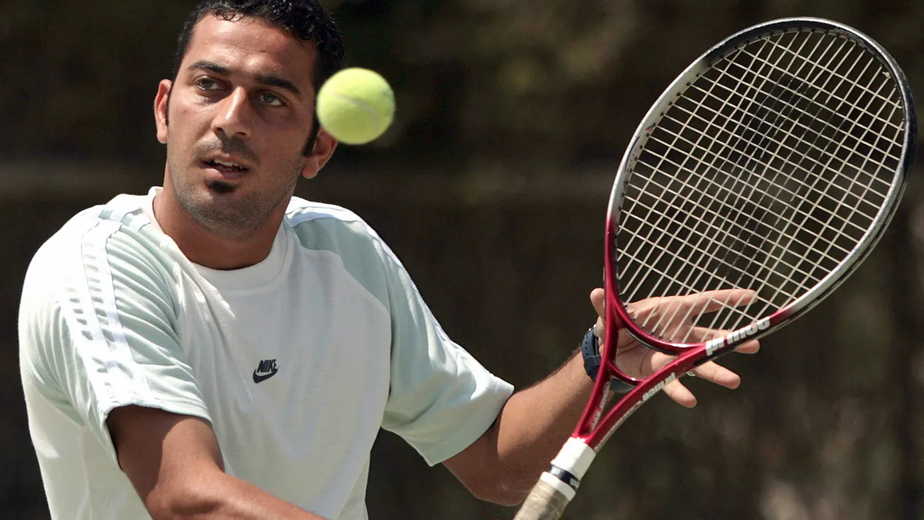 TENNIS-DAVIS-IRQ HORIZONTAL TO GO WITH AFP FEATURE BY PATRICK FORT: Iraqi tennis player Akram Mustafa Abdulkarim plays tennis with his friends at a hotel in central Baghdad, 12 April 2007. Putting together a team for next month's Davis Cup Group IV Asia/O
