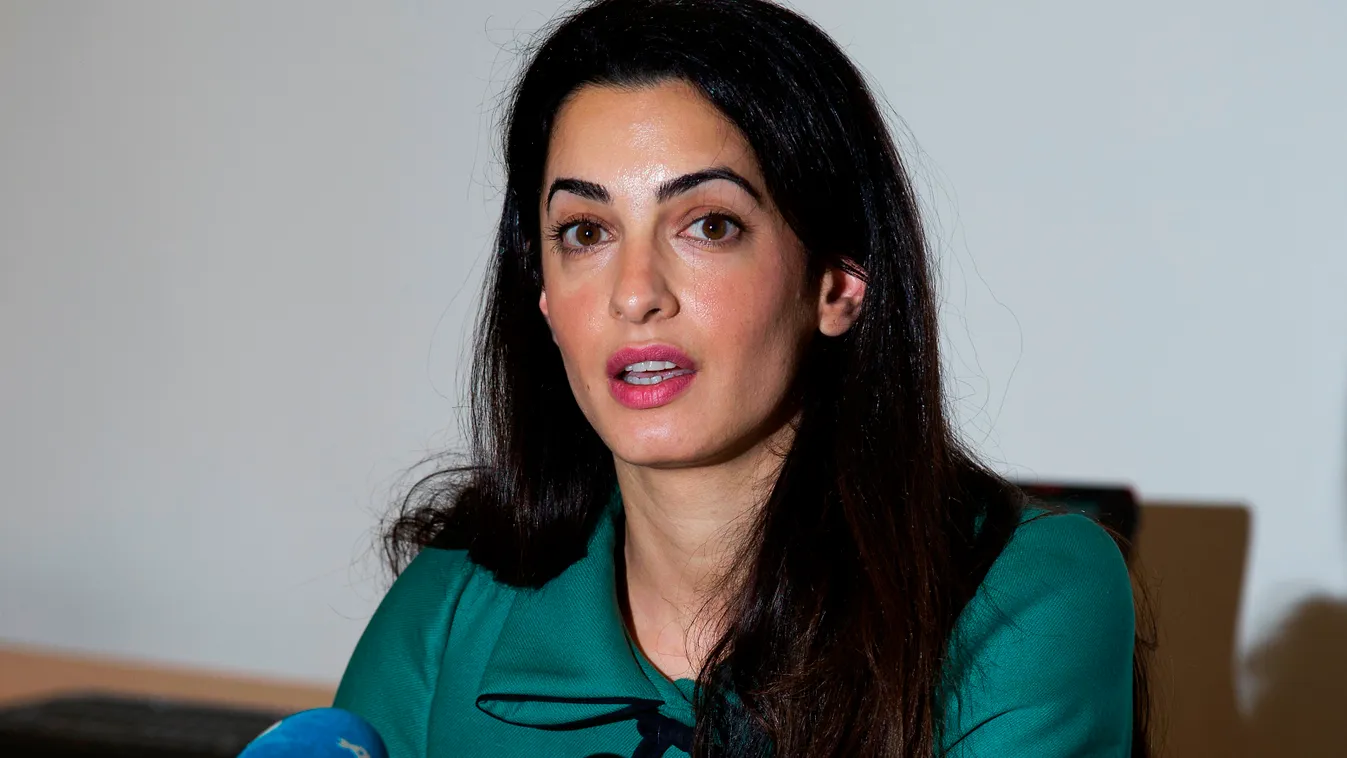 Lawyer Amal Alamuddin is pictured during a press conference in London on November 5, 2012. The British law firm that employs George Clooney's girlfriend Amal Alamuddin confirmed on Monday April 28, 2014, that the couple were engaged and offered its congra