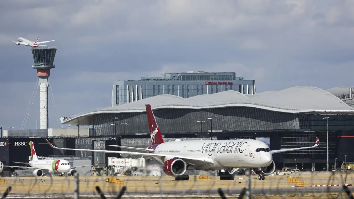 Virgin Atlantic Airways Airbus A350-1000 Taxiing At London Heathrow Airport 2022 Above Air Stewardess Air Traffic Control Tower Air Vehicle Airplane Airport Runway At The Gates - Band Brand Name Business Finance and Industry Cargo Container Civil Aviation
