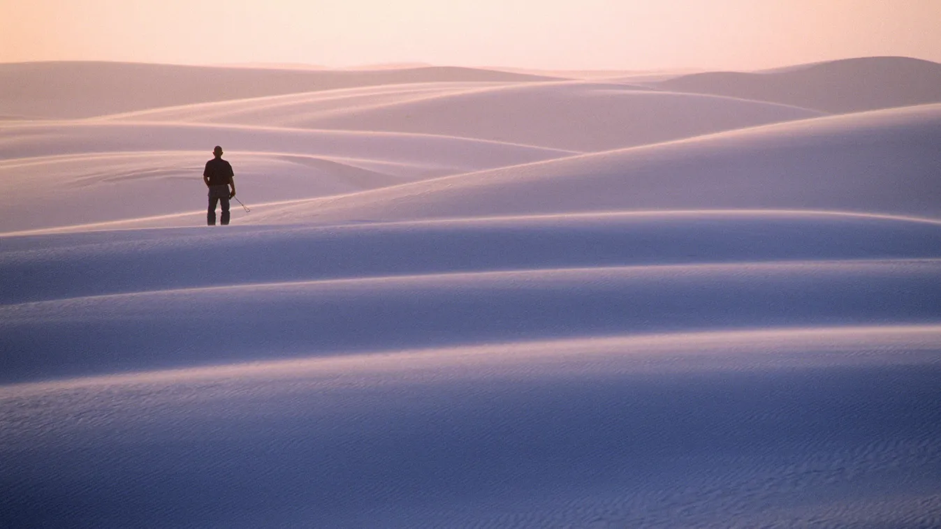 ALONE AMERICA CHARACTER DUNE HORIZON ISOLATED LANDSCAPE NATIONAL PARK NEW MEXICO NORTH AMERICA PEOPLE SAND SANDS NATIONAL MONUMENT SILHOUETTE SOLITUDE WHITE SANDS WHITE SANDS NATIONAL MONUMENT HORIZONTAL 