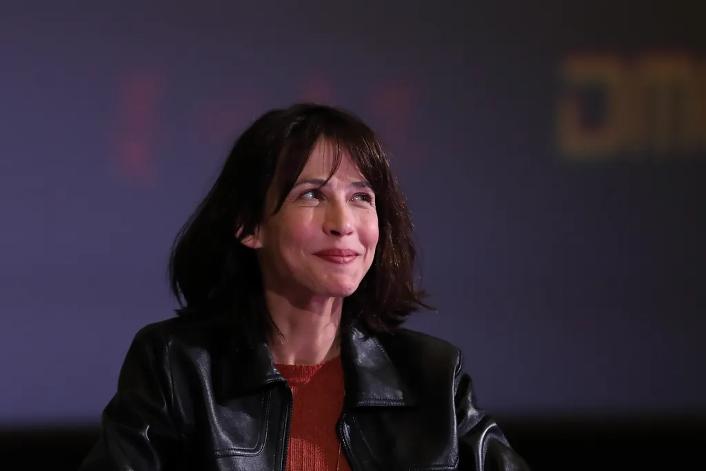 Sophie Marceau wows fans with feminine beauty and charm to promote 'Mrs. Mills' in Beijing China Chinese Beijing Sophie Marceau star celeb celebrity 