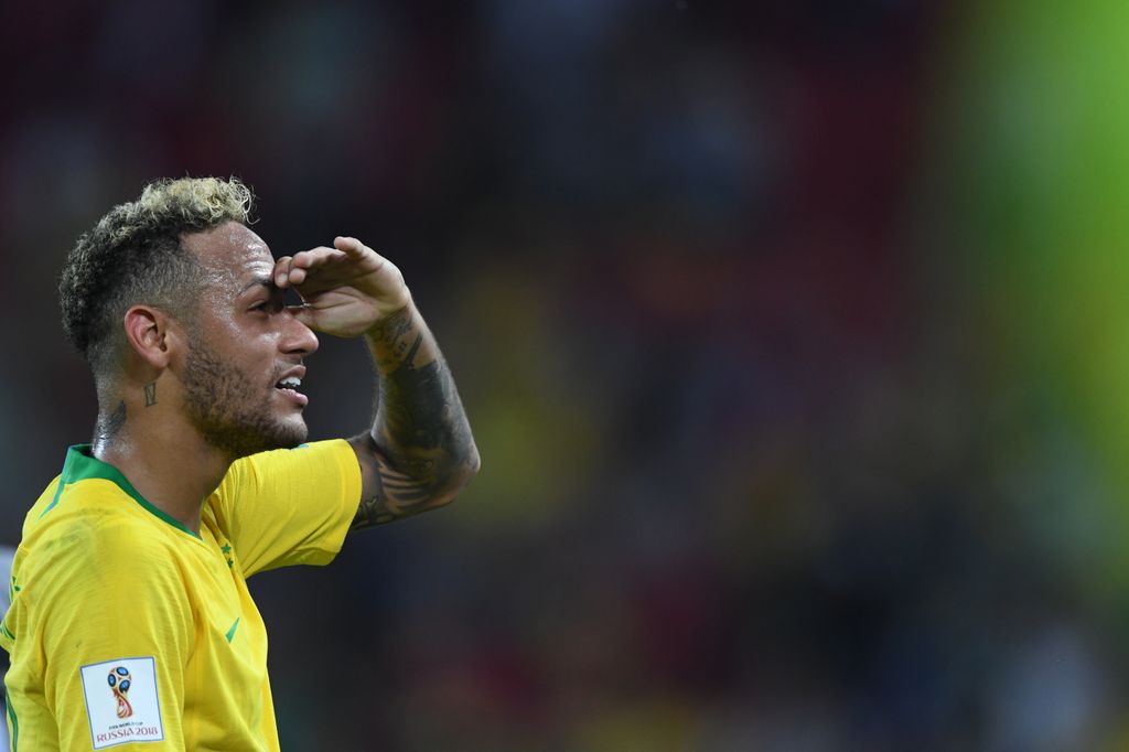 Brazil's forward Neymar celebrates their win in the Russia 2018 World Cup Group E football match between Serbia and Brazil at the Spartak Stadium in Moscow on June 27, 2018. / AFP PHOTO / Kirill KUDRYAVTSEV / RESTRICTED TO EDITORIAL USE - NO MOBILE PUSH A