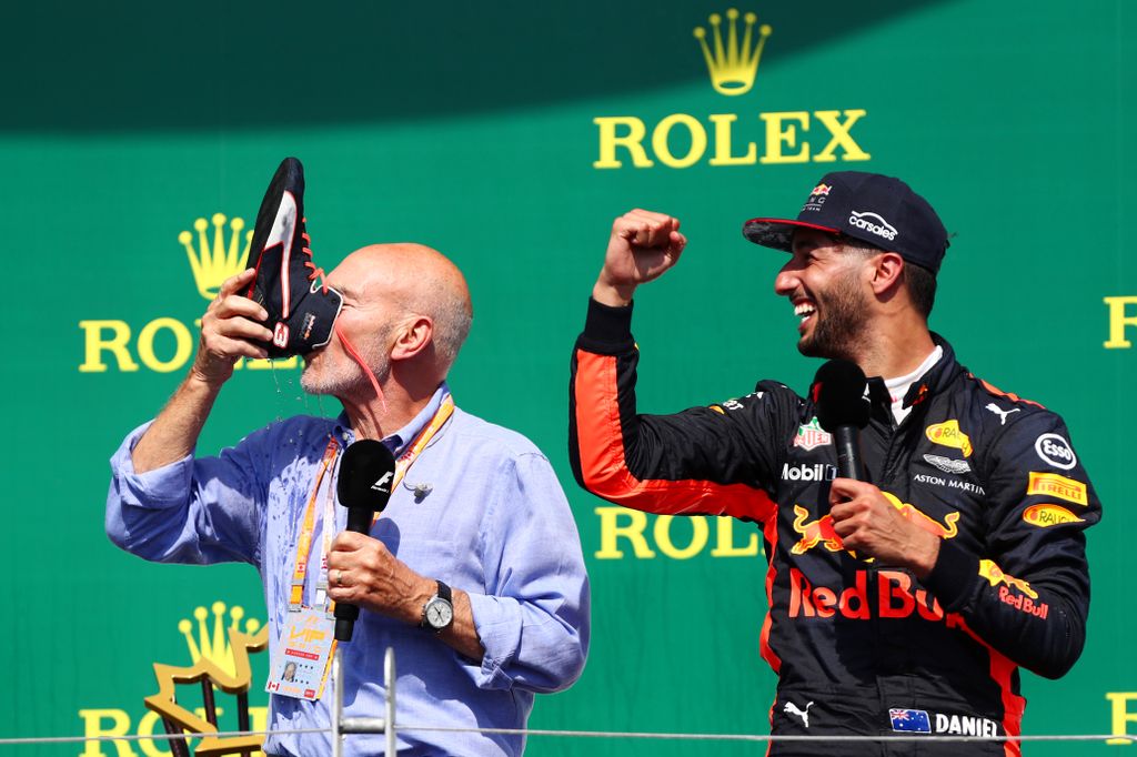 Canadian F1 Grand Prix MONTREAL, QC - JUNE 11:  Daniel Ricciardo of Australia and Red Bull Racing celebrates on the podium with Patrick Stewart and a shoey after finishing third in the Canadian Formula One Grand Prix at Circuit Gilles Villeneuve on June 1