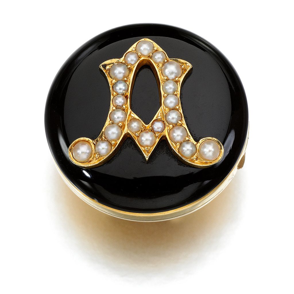 Royals Victoria auction

Queen Victoria's onyx and seed pearl button 