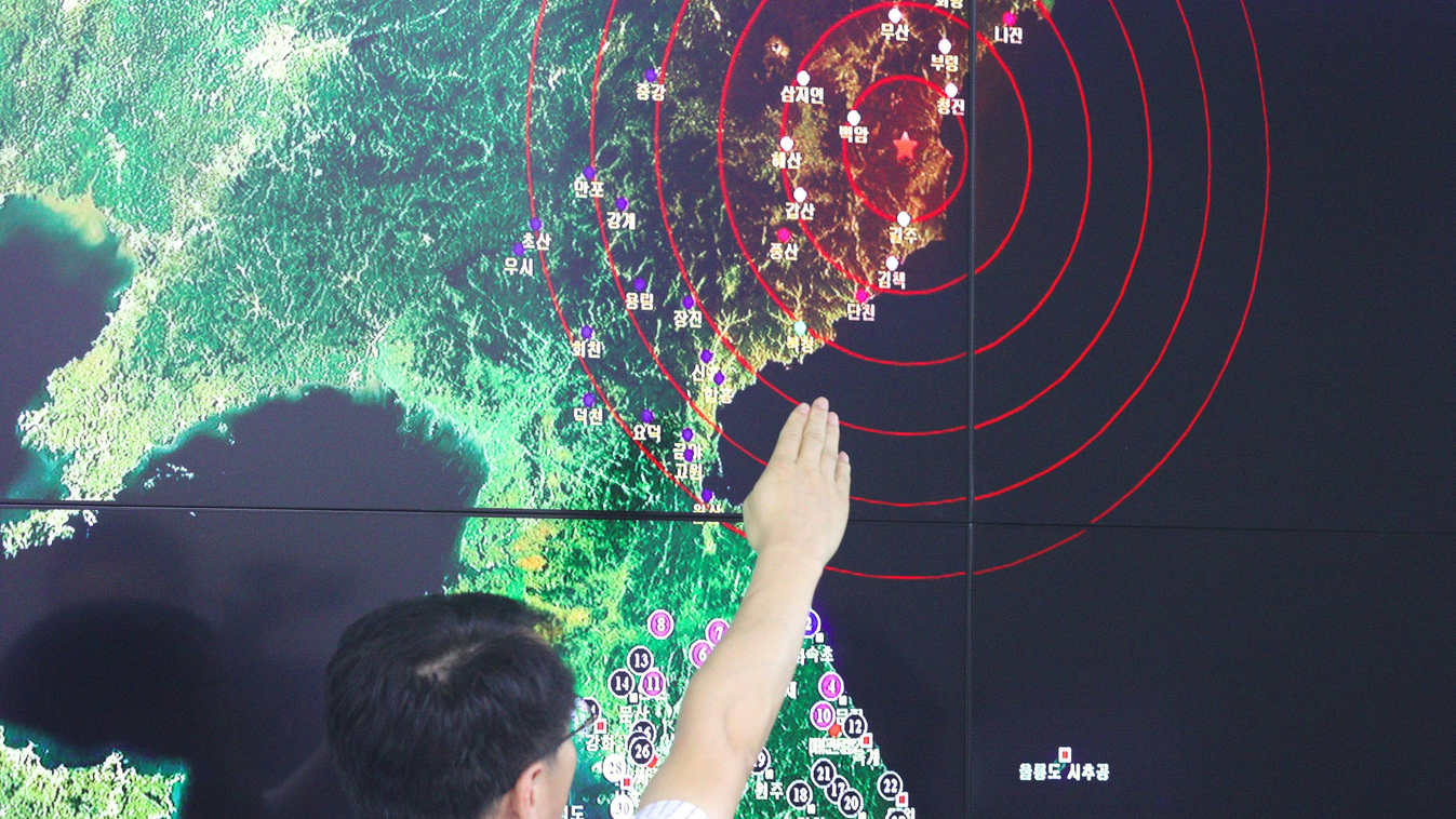 Horizontal A South Korean official points to a map showing the epicenter seismic waves in North Korea, at the Korea Meteorological Administration in Seoul on September 9, 2016 following news of another nuclear test by North Korea.
North Korea has conducte