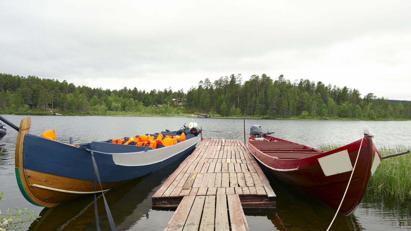 Boats,Waiting,For,Tourists,On,River,"lemmenjoki",In,Finland. nature,tourism,river,travel,water,boat,landscape,finland 